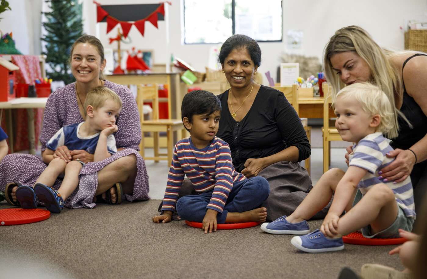 Children with their parents at a TSH group therapy session.